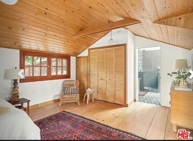 bedroom featuring wood ceiling, light hardwood / wood-style floors, a closet, and vaulted ceiling with beams