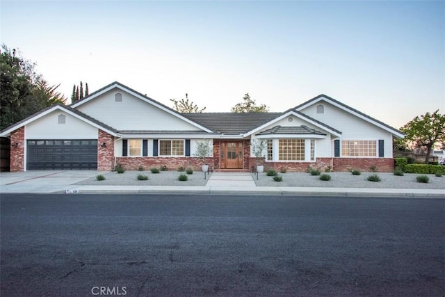 single story home featuring a garage