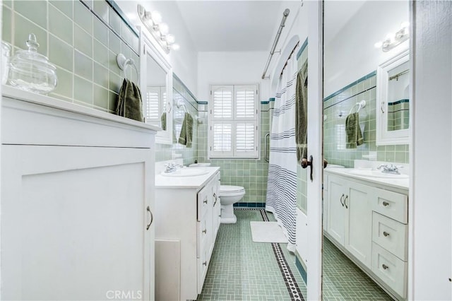 bathroom featuring tile walls, tile patterned flooring, vanity, curtained shower, and toilet