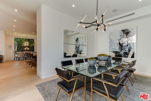 dining room with light hardwood / wood-style flooring