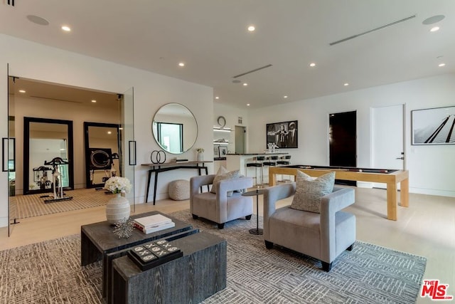 living room featuring light wood-type flooring