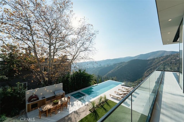 view of pool with a mountain view