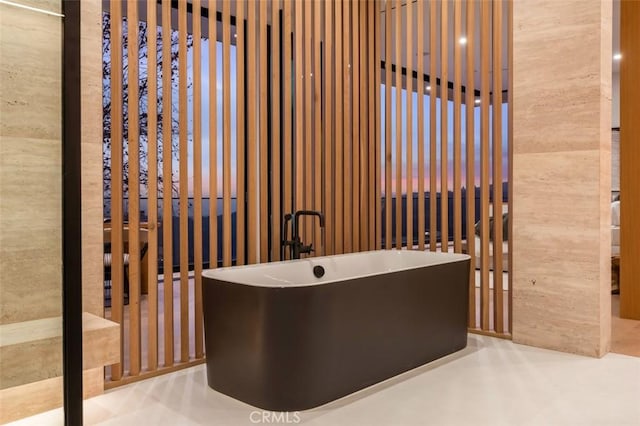 bathroom featuring sink and a bathtub