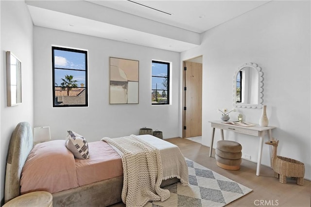 bedroom featuring multiple windows