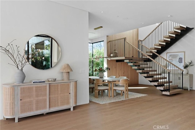 staircase featuring hardwood / wood-style flooring