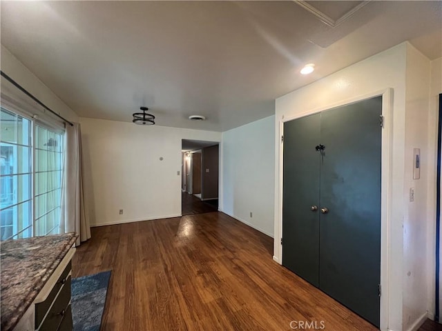 interior space with dark hardwood / wood-style flooring