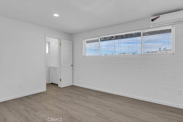 spare room with light wood-type flooring