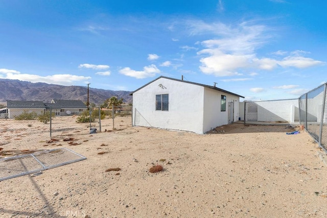 exterior space featuring a mountain view