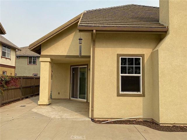 back of house featuring a patio