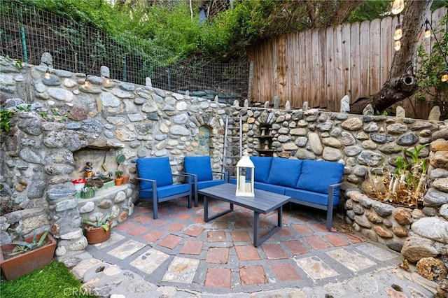 view of patio with an outdoor living space