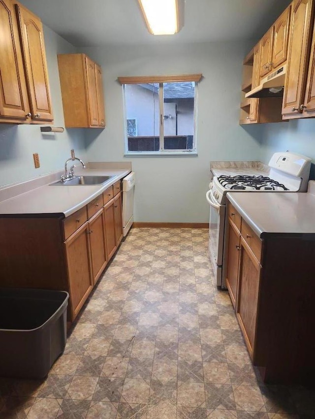 kitchen with sink and white appliances