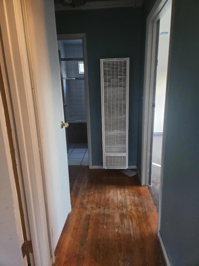 hallway with dark wood-type flooring