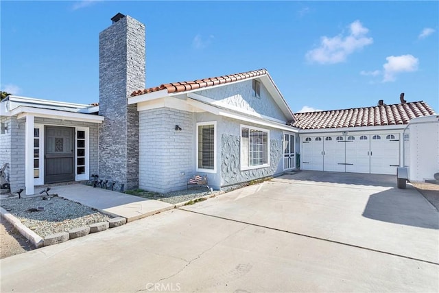 view of front of home with a garage