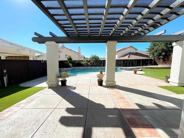 view of patio featuring a fenced in pool and a pergola