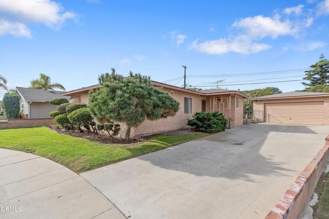 ranch-style house with a garage and a front yard