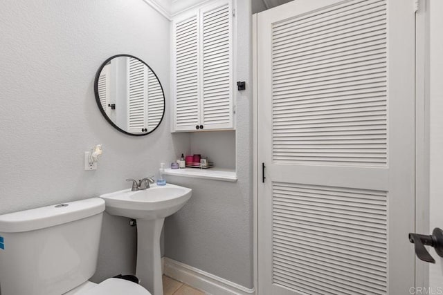 bathroom with sink and toilet