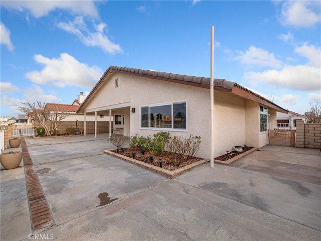 exterior space with a patio area