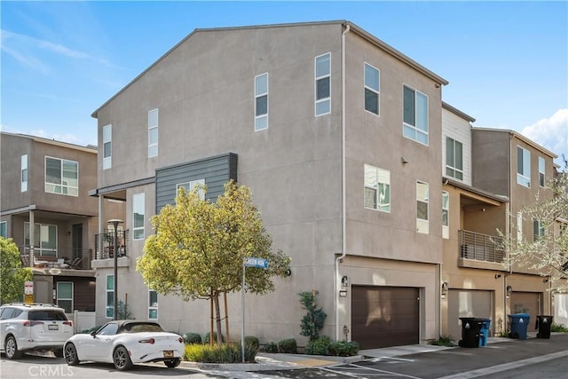 view of building exterior featuring a garage