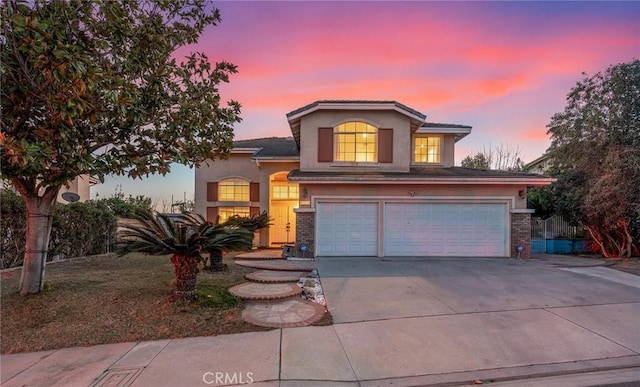 view of property with a garage