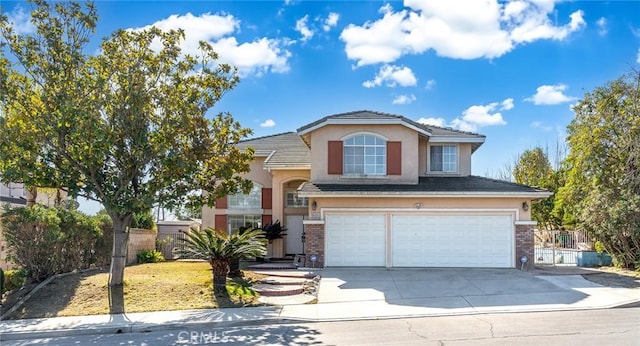 view of front of property featuring a garage