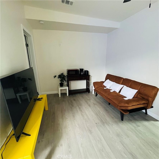 sitting room featuring hardwood / wood-style flooring