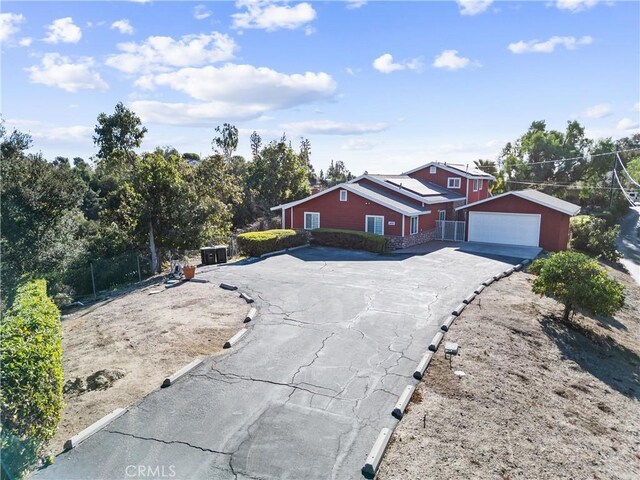 single story home featuring a garage