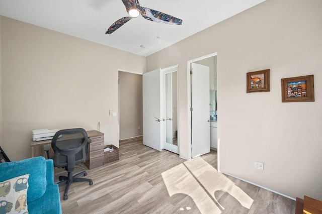 office area with ceiling fan and light wood-type flooring