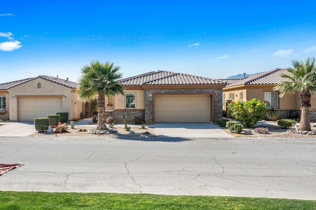 mediterranean / spanish-style house featuring a garage