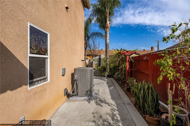 view of patio with central AC unit