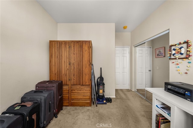 interior space featuring light carpet