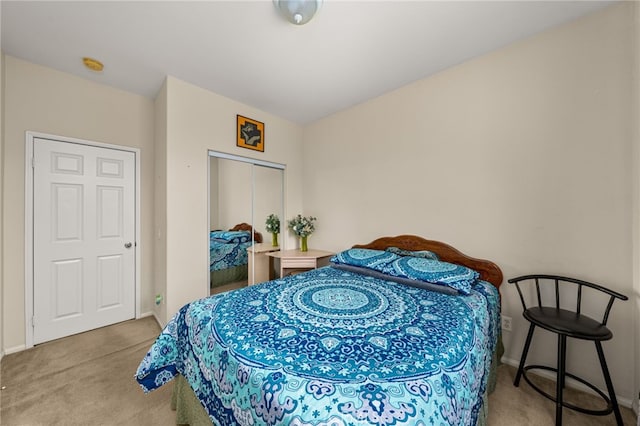 carpeted bedroom with a closet