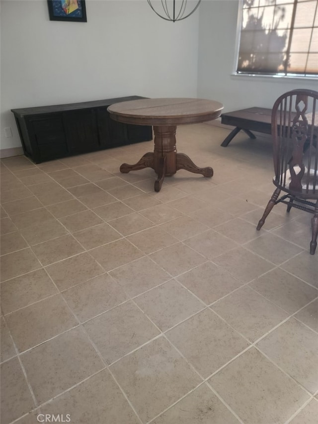 dining room with light tile patterned flooring