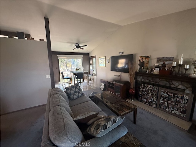 living room with ceiling fan and vaulted ceiling