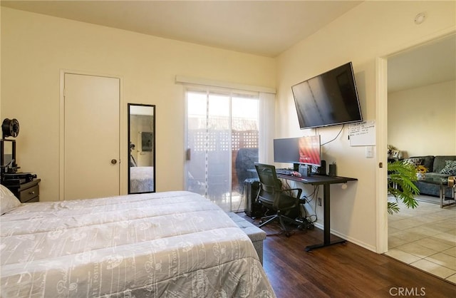 bedroom featuring dark hardwood / wood-style floors