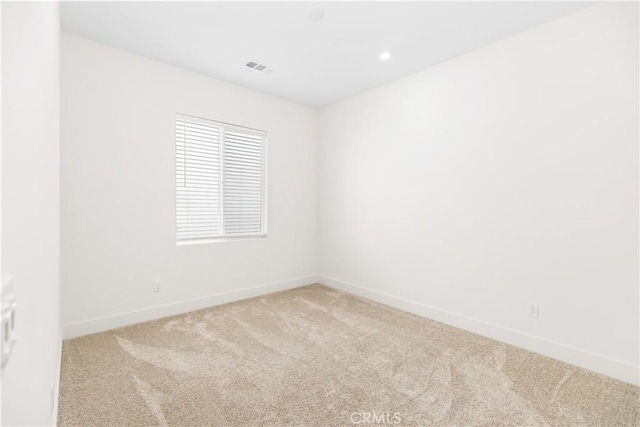 unfurnished room with carpet