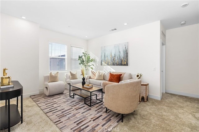 living room with light colored carpet