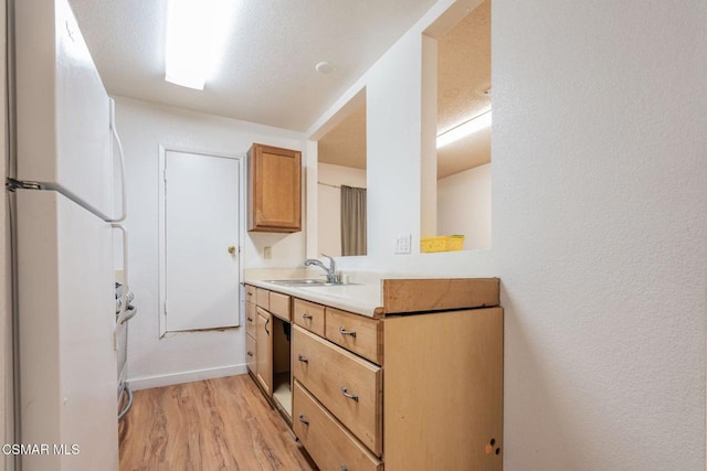 bathroom with vanity and hardwood / wood-style floors