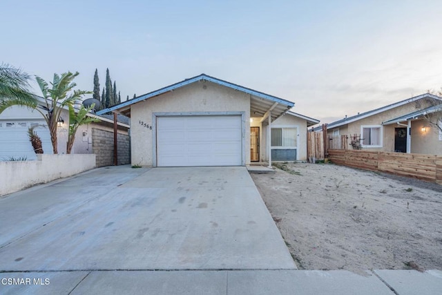 ranch-style home with a garage