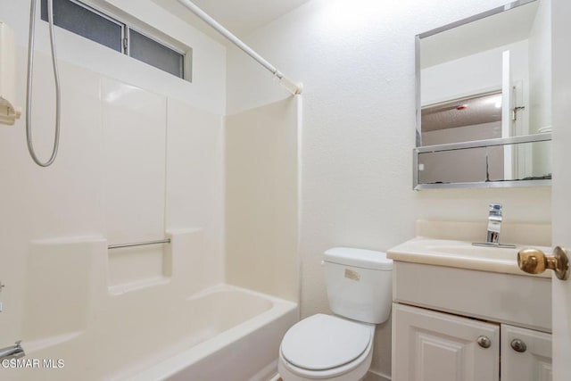 full bathroom featuring vanity, shower / washtub combination, and toilet