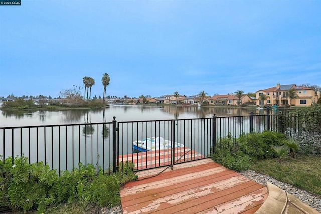 view of dock with a water view