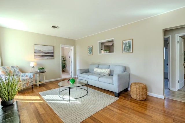 living room with hardwood / wood-style flooring