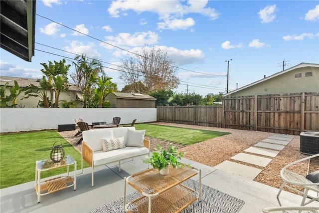 view of yard featuring cooling unit, an outdoor hangout area, and a patio