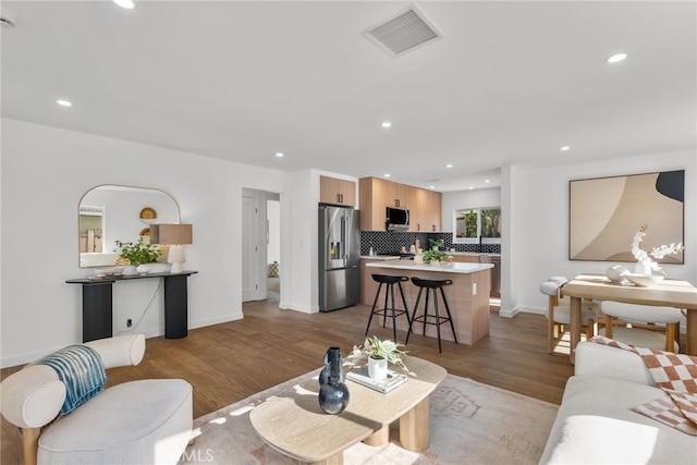 living room featuring light hardwood / wood-style floors