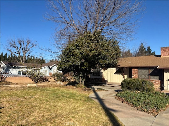 exterior space with a front yard