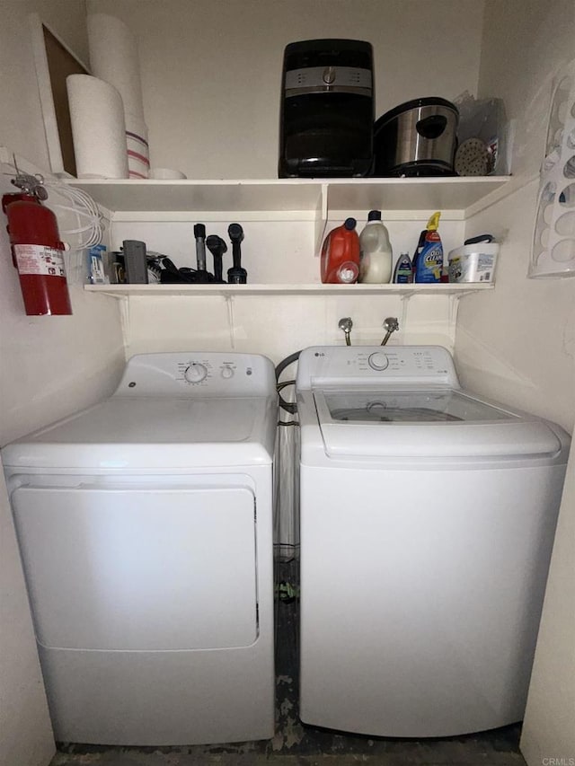 washroom featuring separate washer and dryer