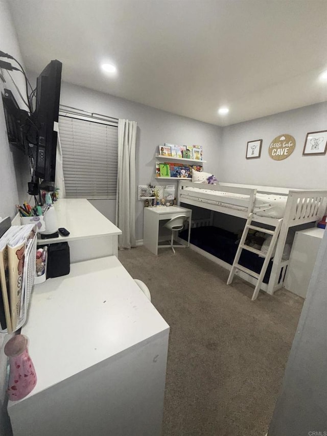 bedroom with dark carpet