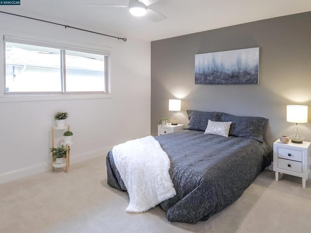 bedroom featuring ceiling fan and carpet flooring