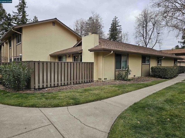 view of front of home with a front yard