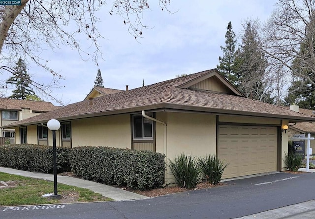 view of home's exterior featuring a garage