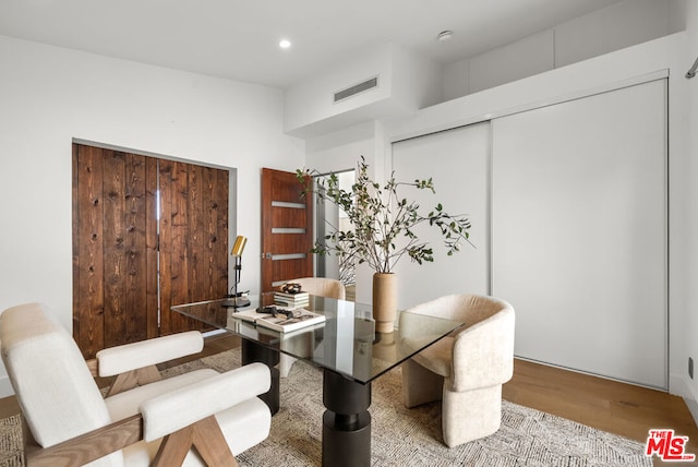 dining area featuring light wood-type flooring